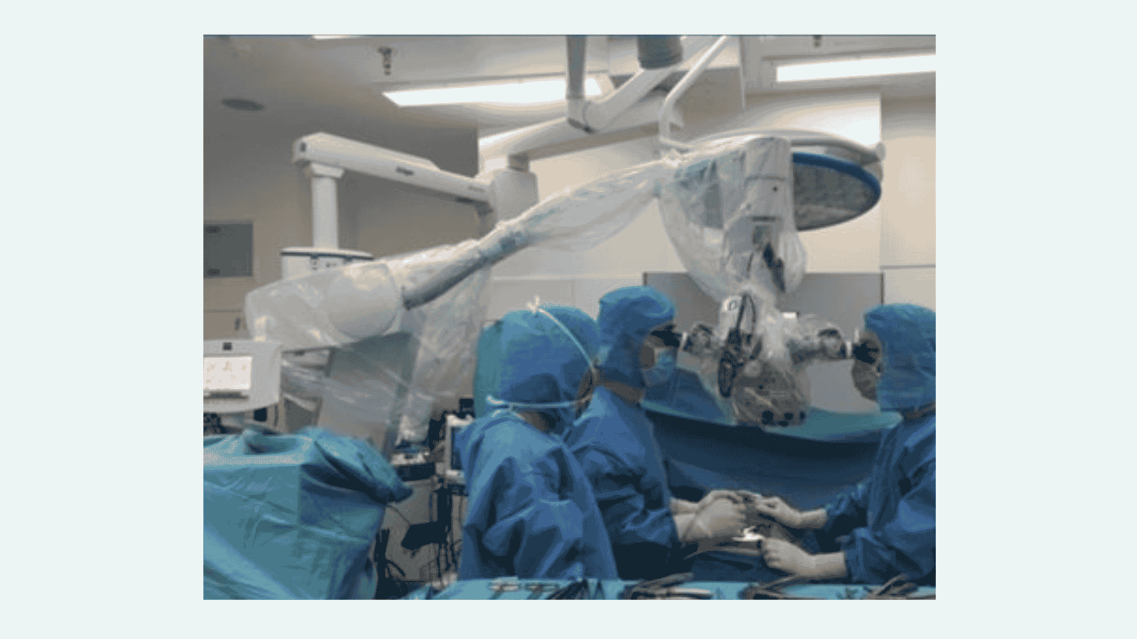 Dr Lau using microscope in keyhole spine surgery