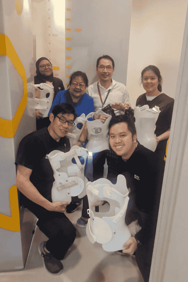 Scoliosis screening programme team with smart brace and EOS microdose imaging
