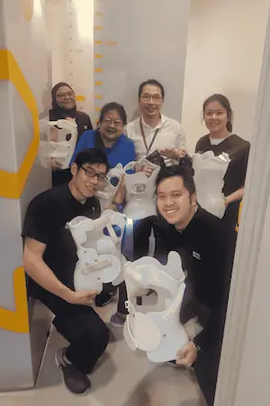 Scoliosis screening programme team with smart brace and EOS microdose imaging
